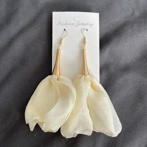 New. Lovely fashion earring. Tulip shaped. 4”